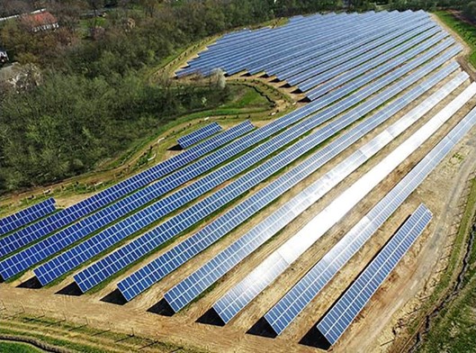 Community Energy solar project at Elizabethtown College, PA. Approximately 60,000 commercial honey bees are cared for in the beehives under the Elizabethtown solar panels.